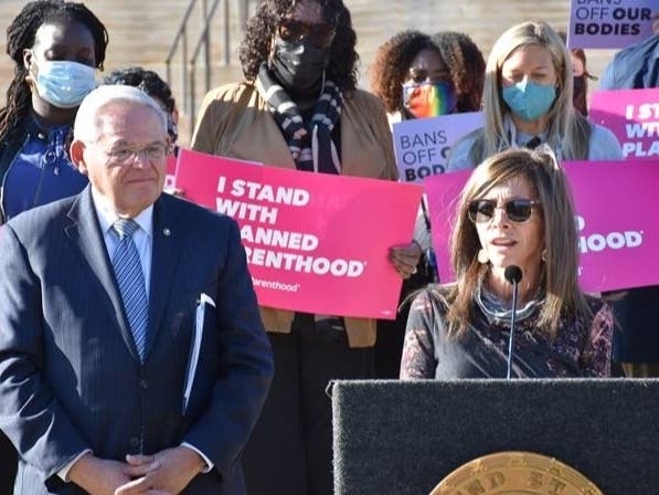 Activists with Planned Parenthood and the National Organization for Women of New Jersey joined first lady Tammy Murphy and Sen. Bob Menendez at a rally for reproductive rights in Newark on Monday.