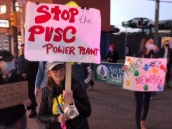 Activists and residents rally in Newark, NJ in November 2021 against a pair of proposed projects in the city, including the Passaic Valley Sewerage Commission’s plan to build a new power plant in the Ironbound neighborhood.