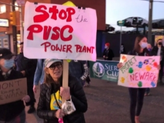 Activists and residents rally in Newark, NJ in November 2021 against a pair of proposed projects in the city, including the Passaic Valley Sewerage Commission’s plan to build a new power plant in the Ironbound neighborhood.
