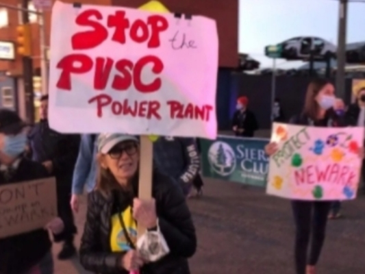 Activists and residents rally in Newark, NJ in November 2021 against a pair of proposed projects in the city, including the Passaic Valley Sewerage Commission’s plan to build a new power plant in the Ironbound neighborhood.