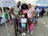 Newark police officers in the city’s 2nd Precinct recently organized a community event in a lot on Broadway for local kids and parents, including a special guest, whom they called a "6-year-old medical miracle.”