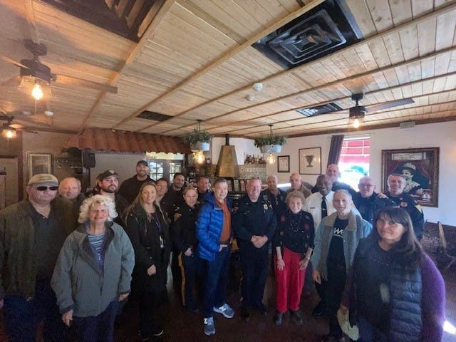 Nutley police officers celebrated a successful “Coffee with a Cop” event with the community on Nov. 14.