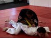 Eldridge Hawkins Jr. (in black), the founder of Ken-Fu Nunchaku Jutsu, demonstrates a takedown technique with the aid of student, Gage Knopf.