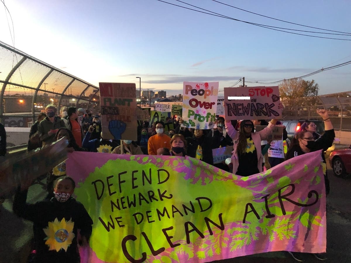 During their April 5 meeting, the Newark City Council unanimously voted in favor of a resolution that opposes the Passaic Valley Sewerage Commission’s plan to build a natural gas power plant. Above, advocates rally against the proposal earlier this year.