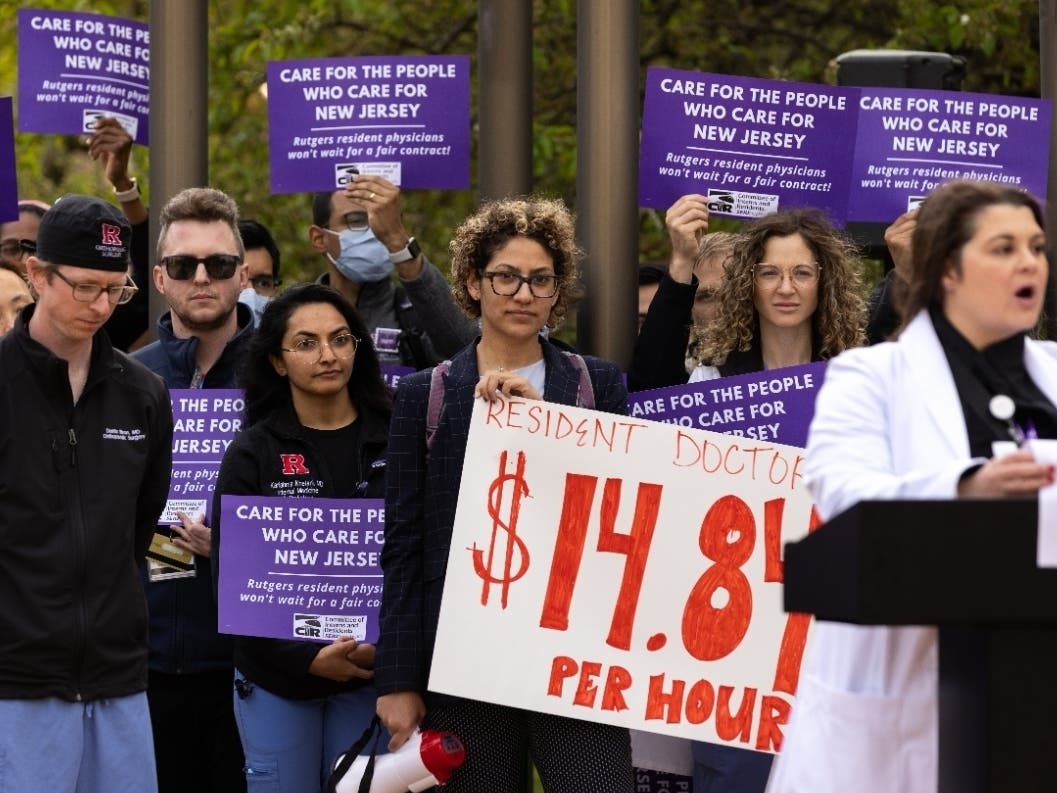 Dozens of unionized resident physicians and fellows at Rutgers gather at Rutgers New Jersey Medical School at University Hospital in Newark on April 27 for a "unity break."
