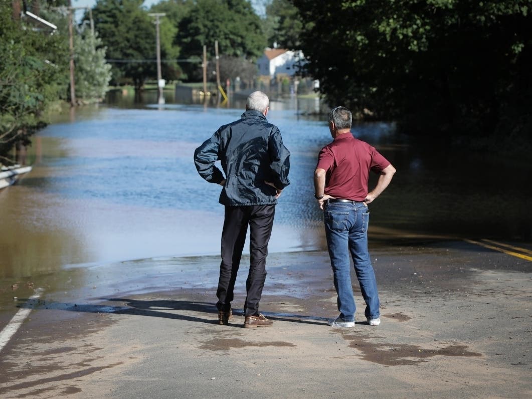New Jersey Governor Phil Murphy tours a flood-damaged area in Hillsborough on September 2, 2021 in the wake of Hurricane Ida.