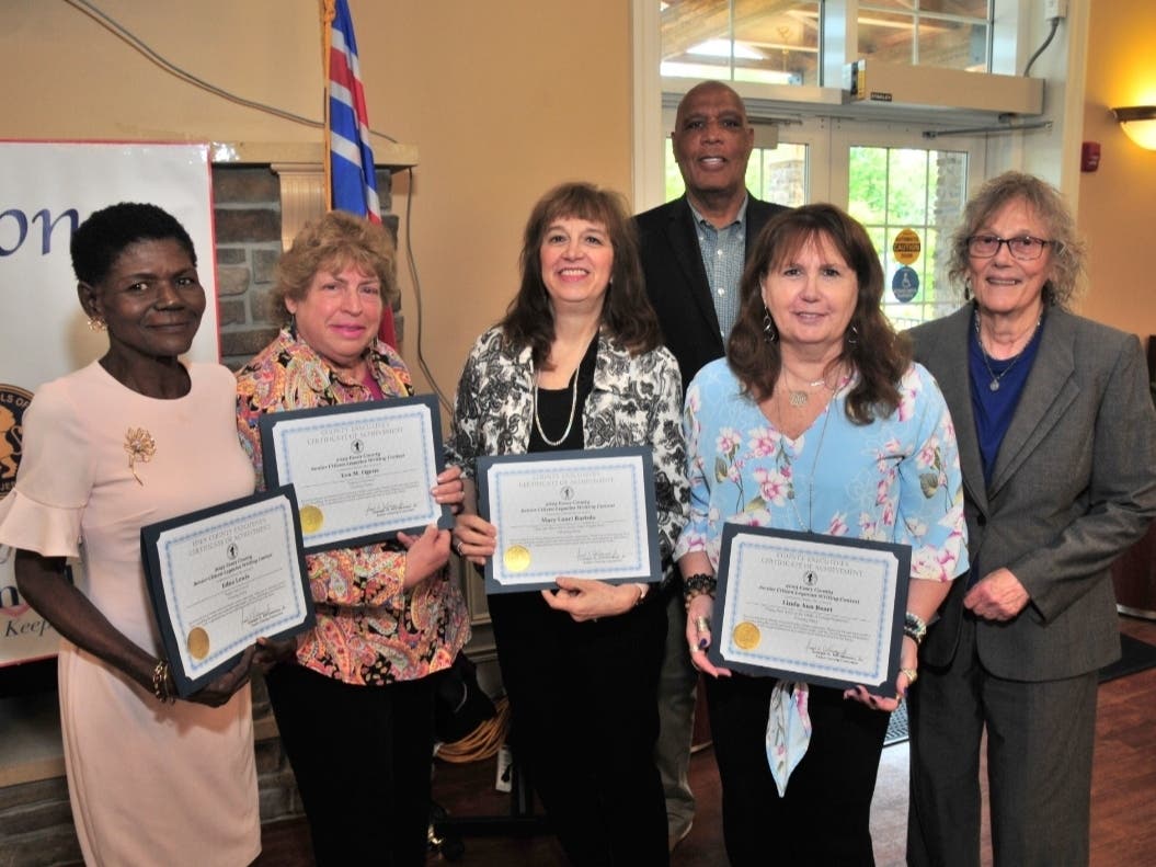 From left (in front): Newark resident Edna Lewis, Caldwell resident Eva M. Ogens (who is represented by her sister Susan Wallenstein), West Orange resident Mary Lauri Bartola, and Nutley resident Linda Ann Buset.