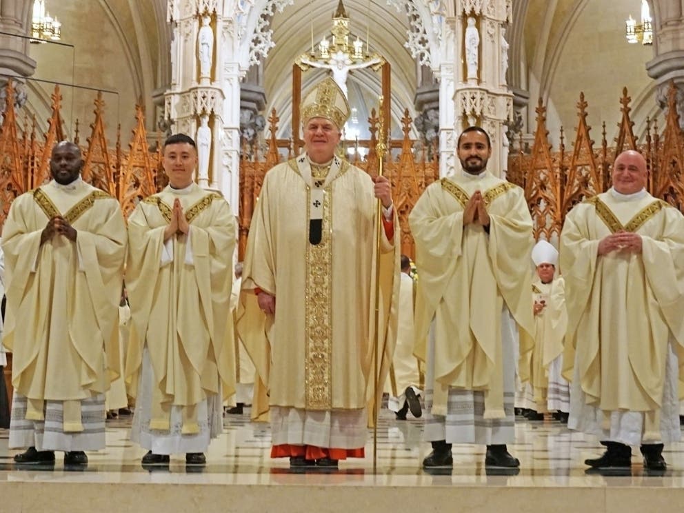 From left to right: Father Frenel A. Phanord, Father JuHyun Andrew Lee, Cardinal Joseph W. Tobin, Father Bernardo Garcia, and Father Robert Burkot.