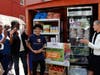 The United Community Corporation launched its community fridge program in 2022, seeking to help Newark residents who can’t afford groceries amid skyrocketing inflation and other economic struggles. Above, residents gather for a ribbon cutting ceremony.