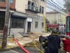 A fire at a three-story building in Newark left 14 people without a home on Tuesday. Nobody was injured in the blaze, authorities said.