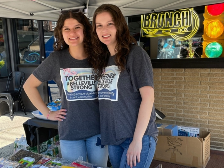A pair of sisters from Belleville recently continued their mission to make the world a better place with the latest installment of their “Wave of Positivity” campaign.