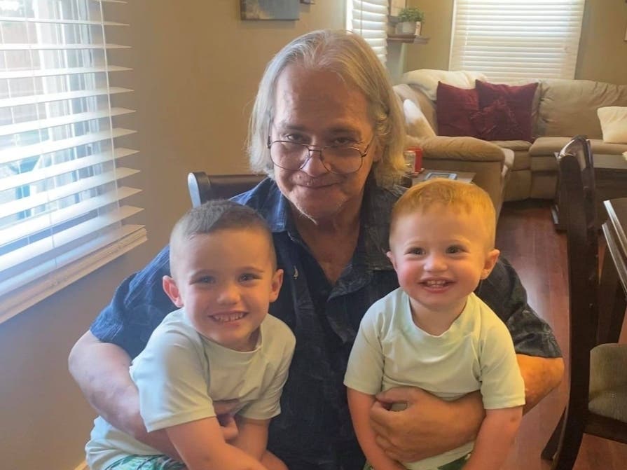 New Jersey resident Ronald Trout shares a joyful moment with his grandchildren. He got a heart transplant in Essex County five years ago on Valentine’s Day.