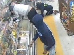Newark police are searching for two men who allegedly robbed a local supermarket at gunpoint on Feb. 22, authorities announced Monday.