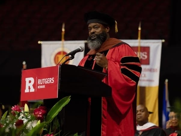 Tariq Trotter, also known as Black Thought, co-founder of The Roots, urged Rutgers-Newark graduates to forge new myths and meaning out of a “collapsing old world” at the school’s recent commencement ceremony.