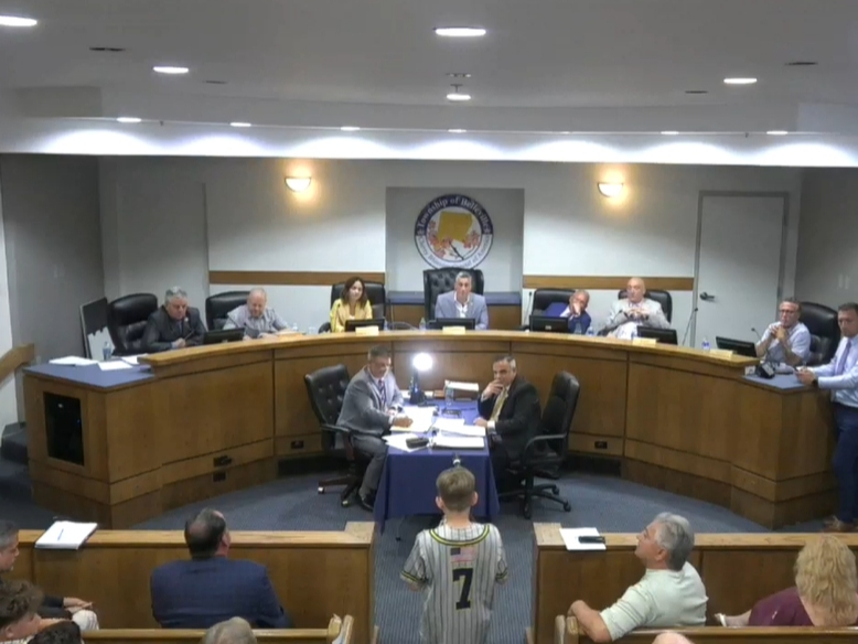 A local youth speaks in support of Belleville Recreation Director Tom Agosta during the town council meeting on May 28.