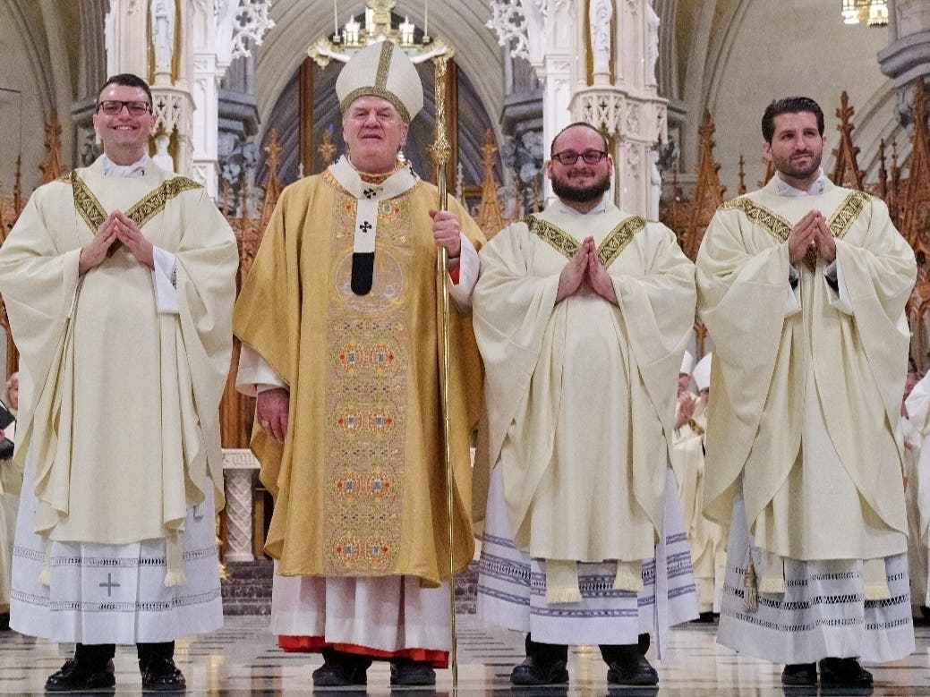From left: Andrew Rubinich, Joseph Tobin, Matteo Matarazzo and Joseph Pavone pose for a photo during the Archdiocese of Newark’s Rite of Ordination in Cathedral Basilica of the Sacred Heart on May 25, 2024.