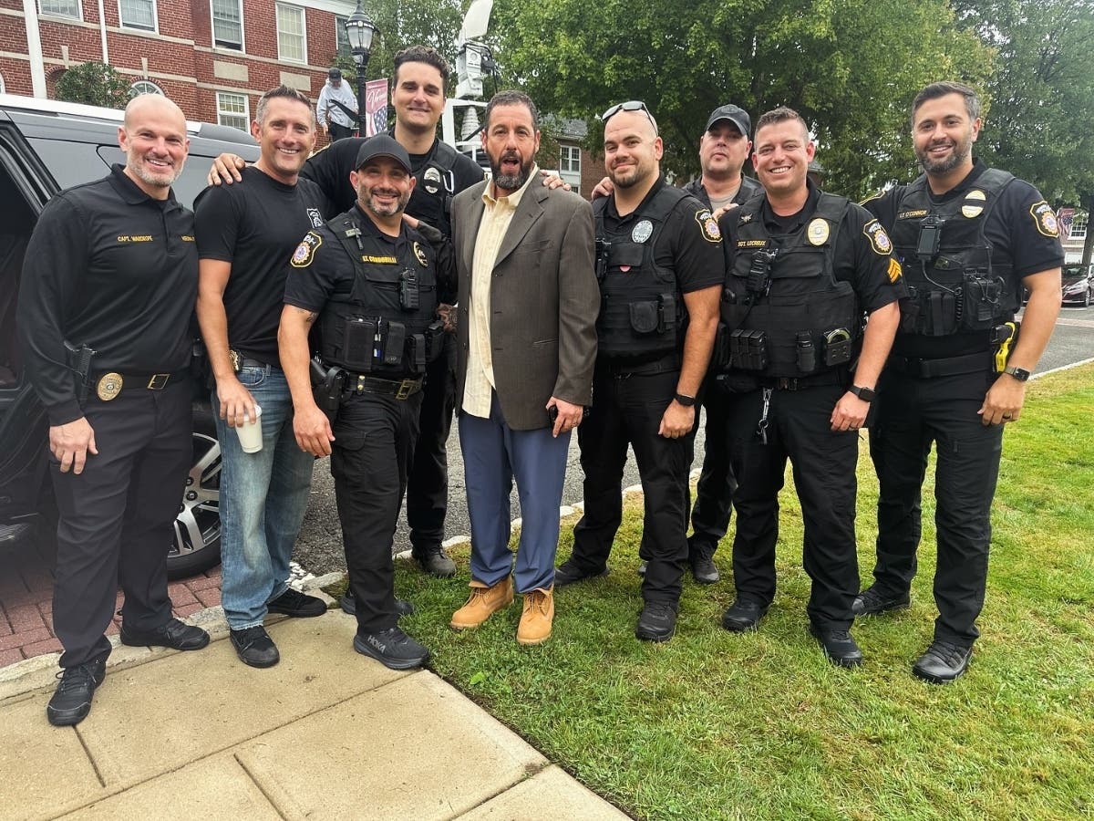 Adam Sandler has been taking time to meet with movie fans in Essex County as he films scenes for “Happy Gilmore 2.” Above, Sandler poses for a photo with officers in the Verona Police Department.