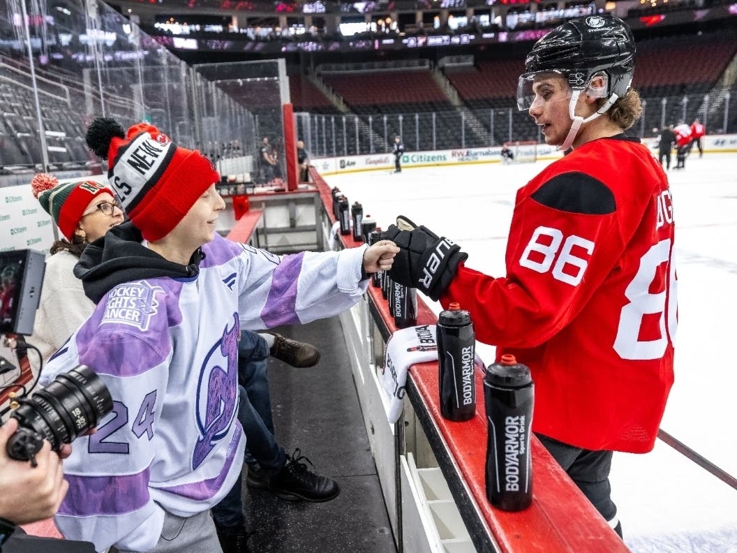 The New Jersey Devils recently hosted their annual Hockey Fights Cancer Night in Essex County, inviting 12-year-old hockey fanatic Theo Koshenkov onto the ice.