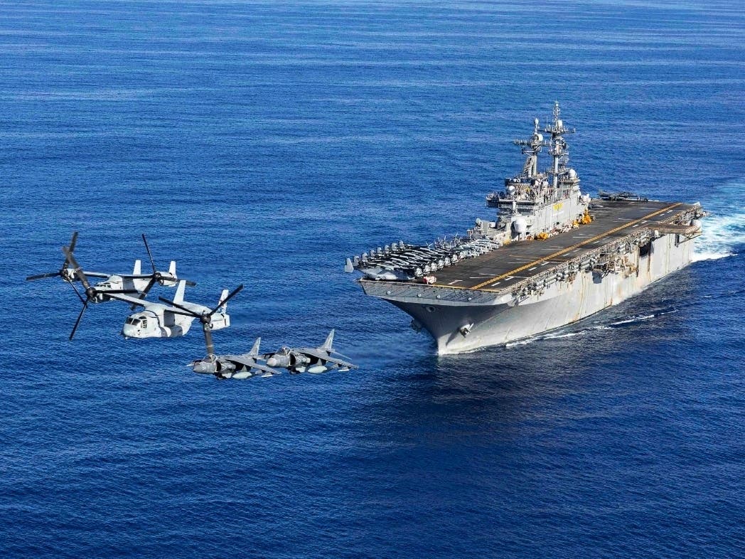 Marine Corps aircraft fly above the amphibious assault ship USS Wasp during operations in the Atlantic Ocean, Nov. 22, 2024.