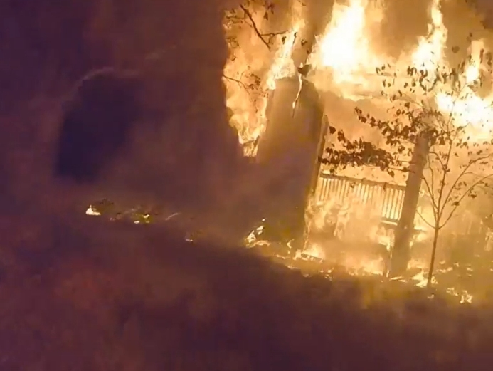 A harrowing trip into a raging house fire was captured on video in Millburn in October.