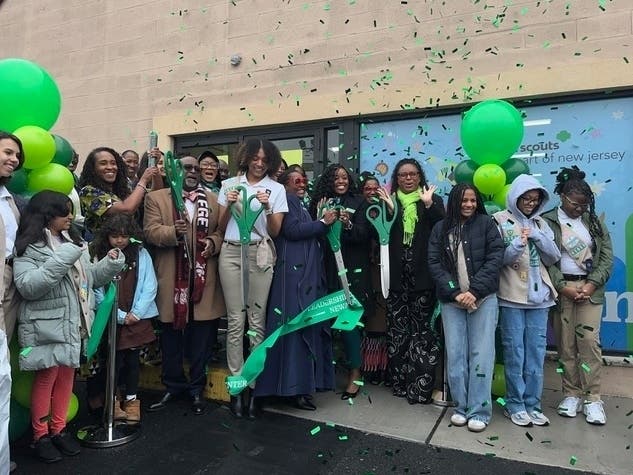 Girl Scouts Heart of New Jersey leadership, Paramount Assets, and community leaders cut the ribbon to the new Girl Scouts Leadership Center in Newark, NJ.