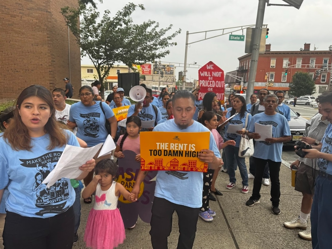 Housing advocates and local residents rally outside City Hall in Passaic, NJ on Aug. 5, 2025. The city council introduced a rent stabilization ordinance for potential adoption at their meeting later that day.