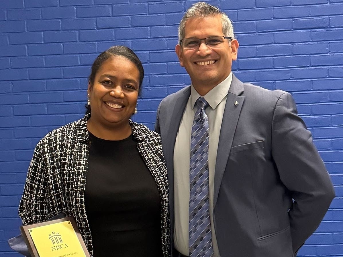 Sherlie Blaise, 2026 Essex County Counselor of the Year, and Dr. Claudio Barbaran, Principal of the Roberto Clemente School.