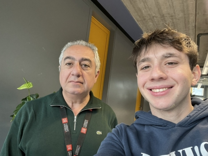 Gubad Ibadoghlu poses for a photo with one of his children, Emin Bayramli.