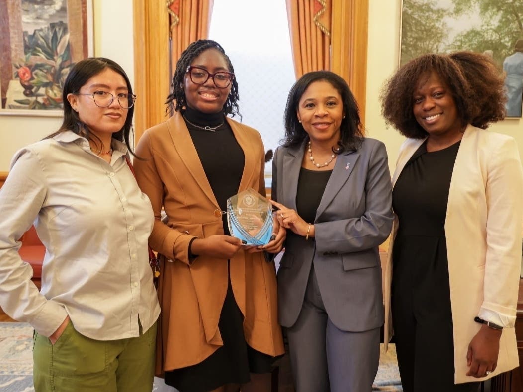 Rashanna James Frison is presented with a John Lewis Youth Leadership Award.