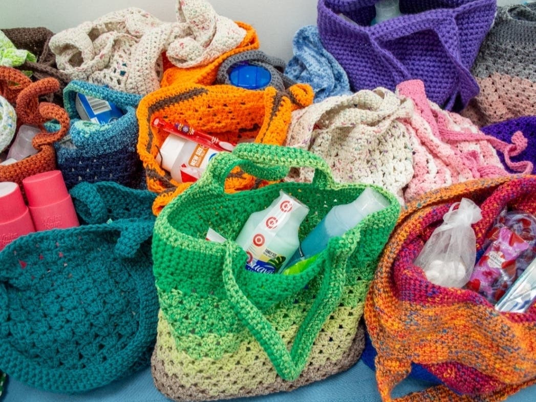 Visitors to The Mercy House’s Elizabeth and Newark locations received hand-knit gift bags donated by the Loops of Love Ministry at St. Michael Parish in Cranford.