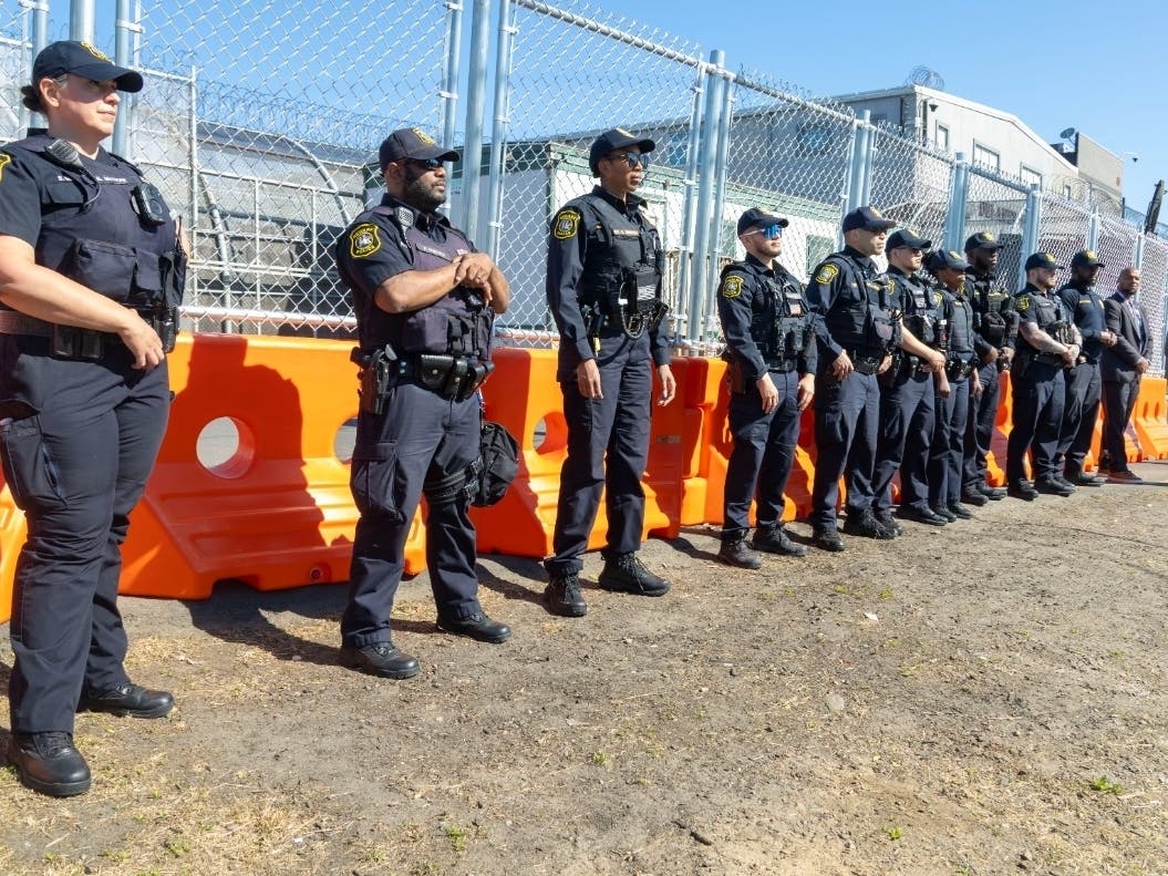 Newark police line up outside Delaney Hall in Newark, NJ during a news conference on June 2, 2026.