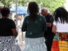 U.S. Rep. LaMonica McIver, Montclair 4th Ward Councilor Aminah Toler, and U.S. Rep. Analilia Mejia stand side-by-side wearing African Ankara skirts provided by Syline Pateat.