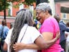 Two Montclair residents find camaradarie and friendship at the town's Juneteenth flag raising event on June 19, 2026.