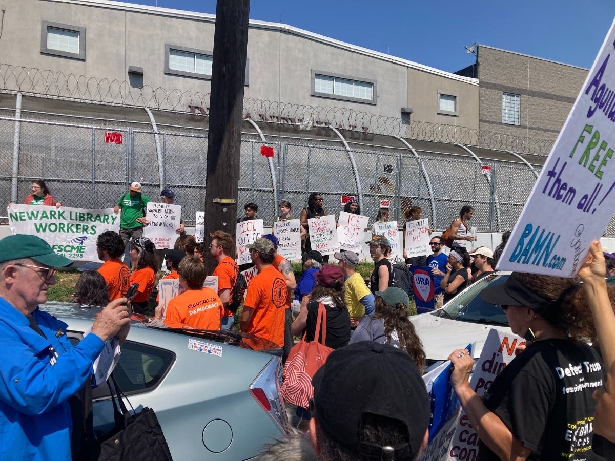 Members of Labor Eyes on ICE rally outside Delaney Hall in Newark, New Jersey on July 26, 2026.