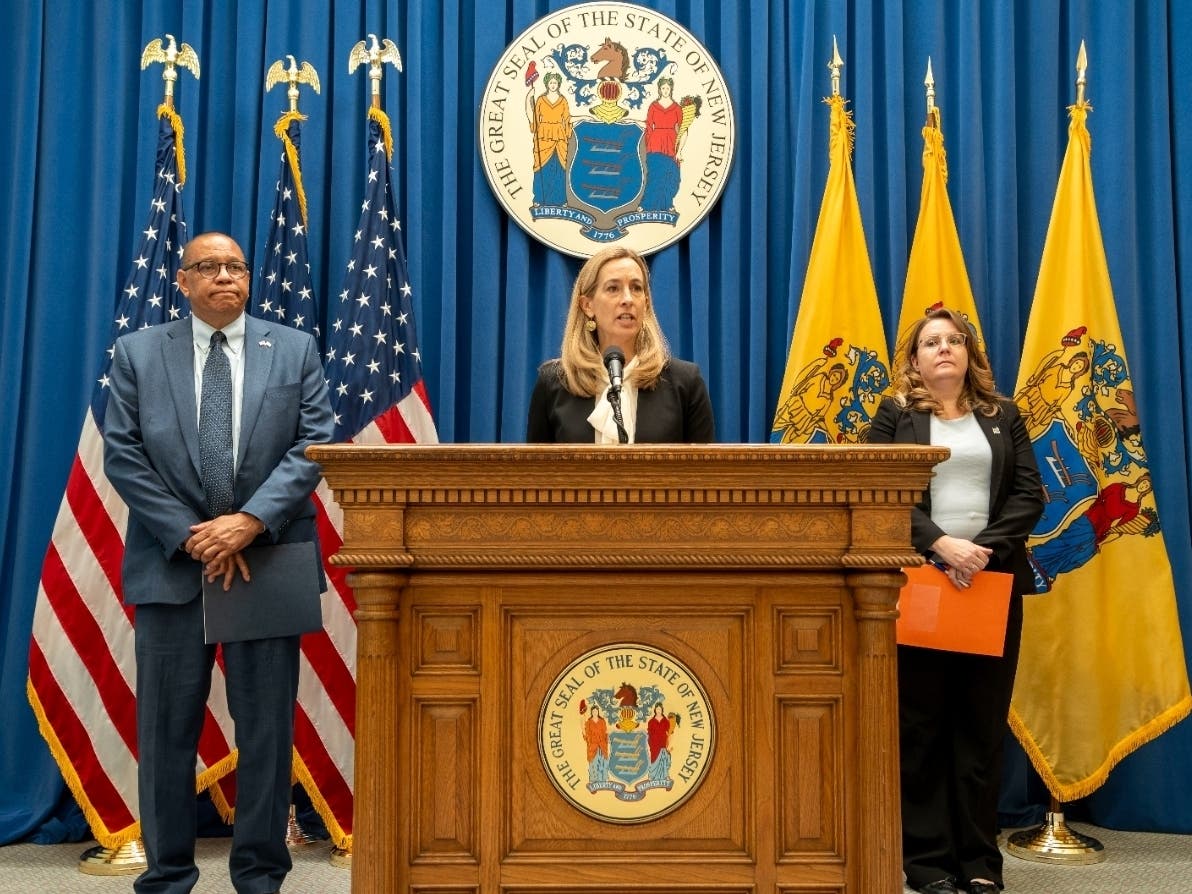 Gov. Mikie Sherrill and Lt. Gov. Dale Caldwell attend a press conference about voter registration in the media room of the statehouse in Trenton, N.J. on July 21, 2026.
