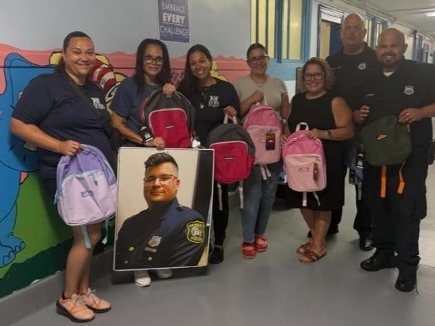 An annual Back-to-School Book Bag Drive was recently held in honor of Ricardo Barbosa, who worked as a police officer in Newark, NJ for years before his passing.