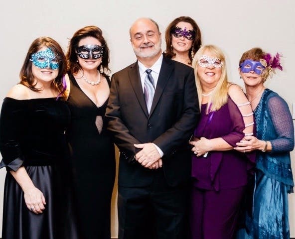 Last year's Masquerade Ball Committee with 2018 Honoree Vincent Freccia III and his wife, Cathy.