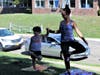 Leslie Centofanti and her son, Brandon, practice the tree pose at Nelson Park.
