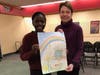 1st Runner Up: Abigail Watkins and Her Poster with Lion Sue Ash