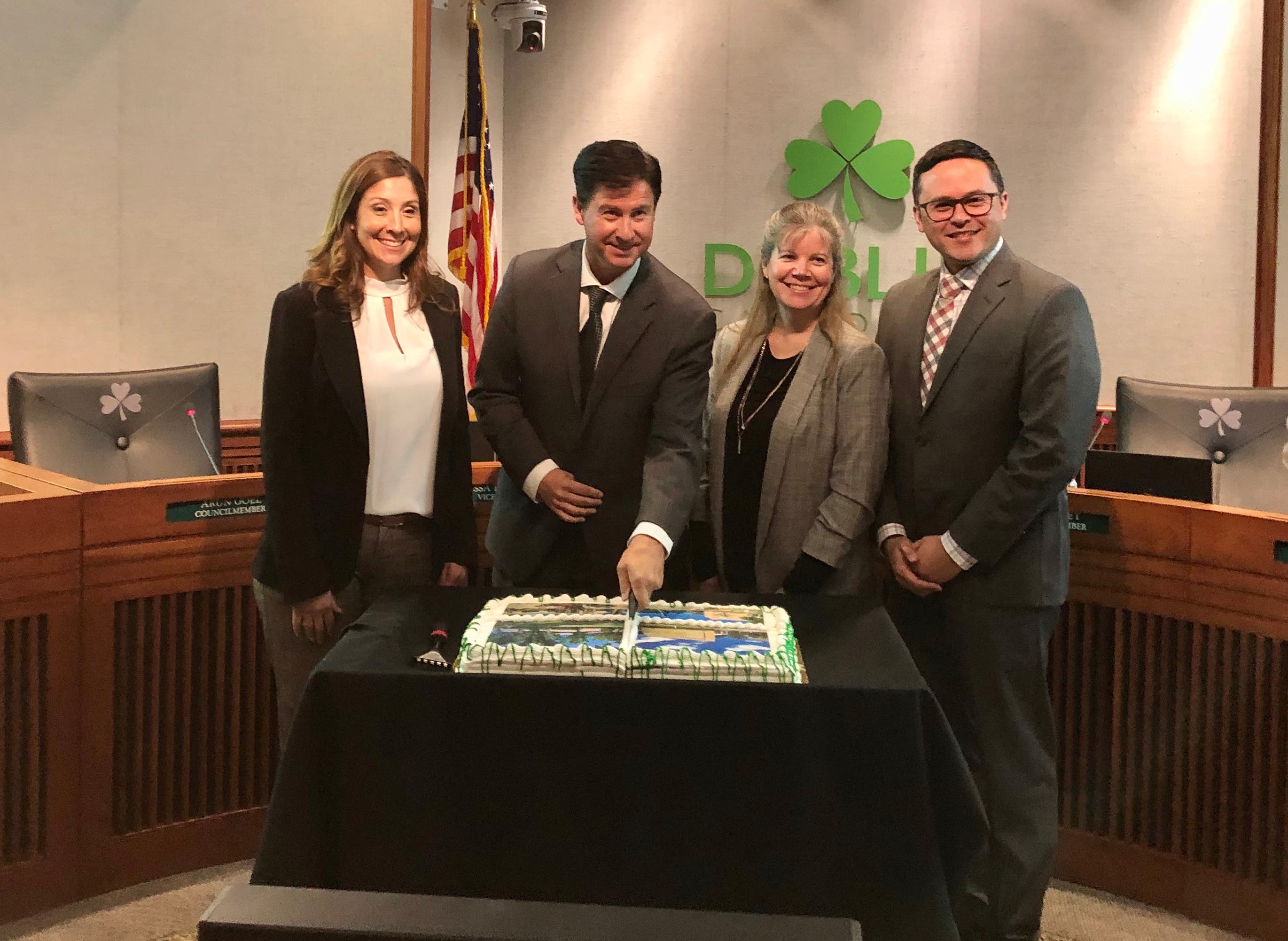 Council Members and cake