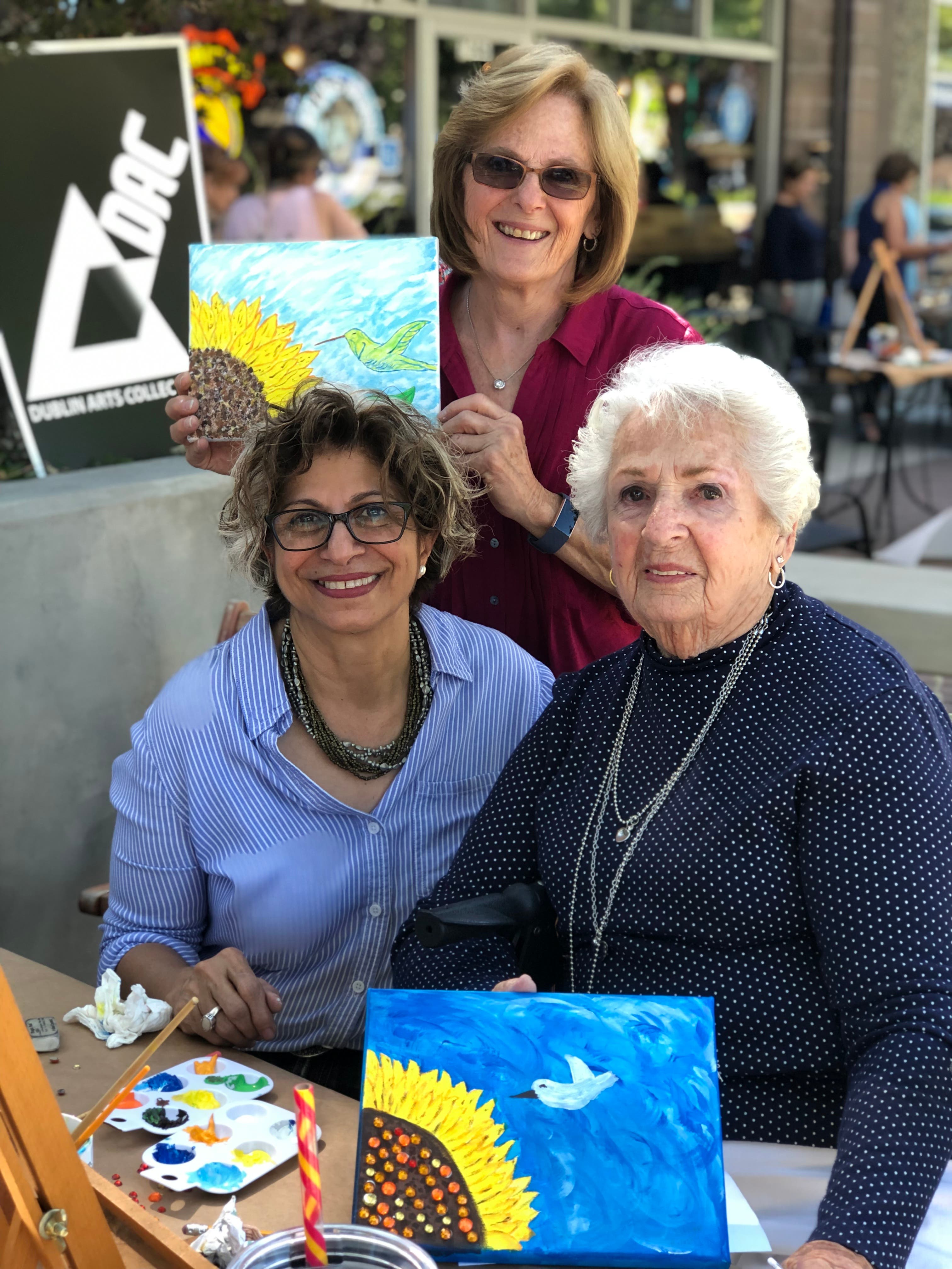 Sawsan Wolski and 'Paint on the Patio' Participants