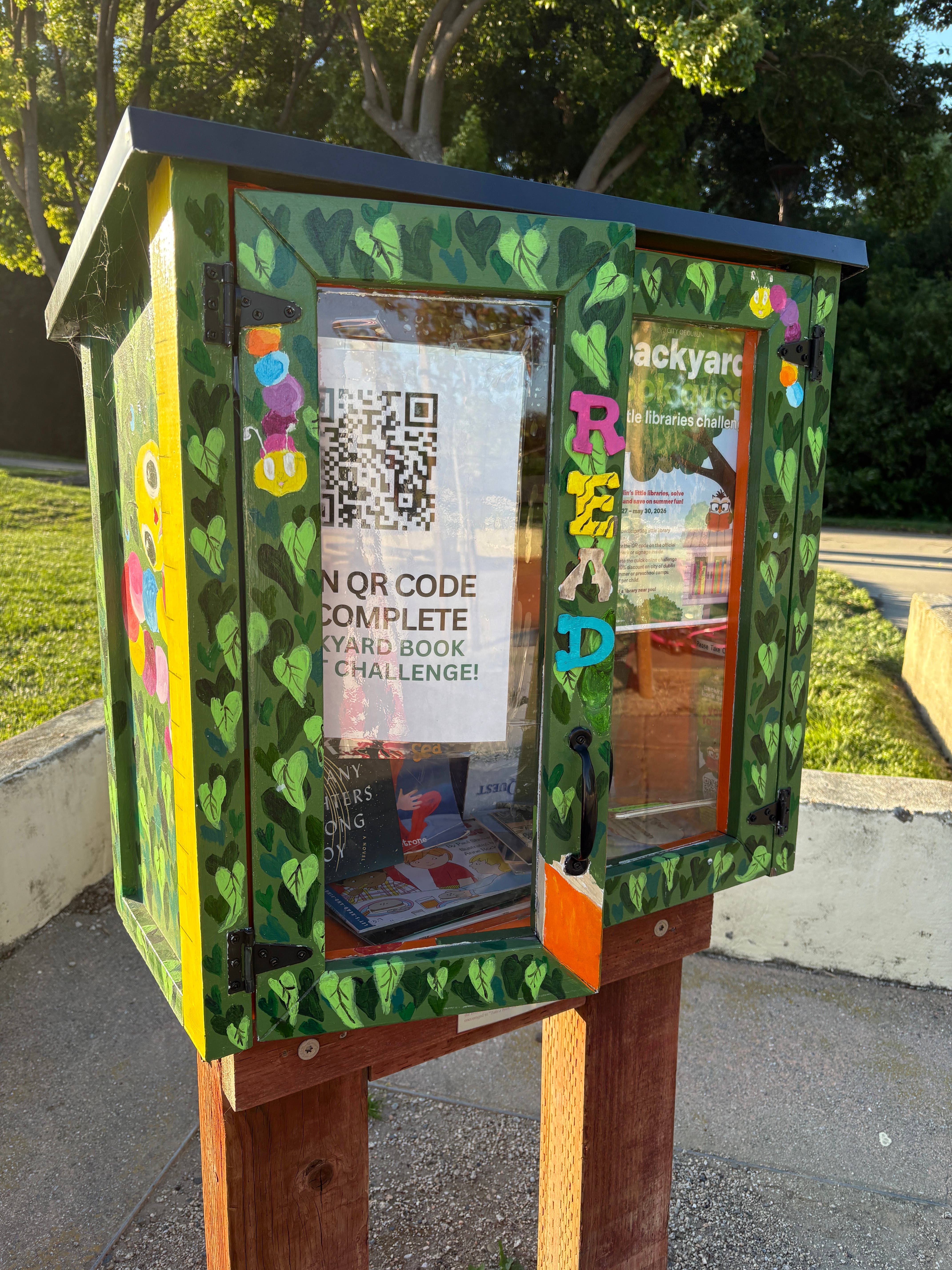 Colorful painted free little library box
