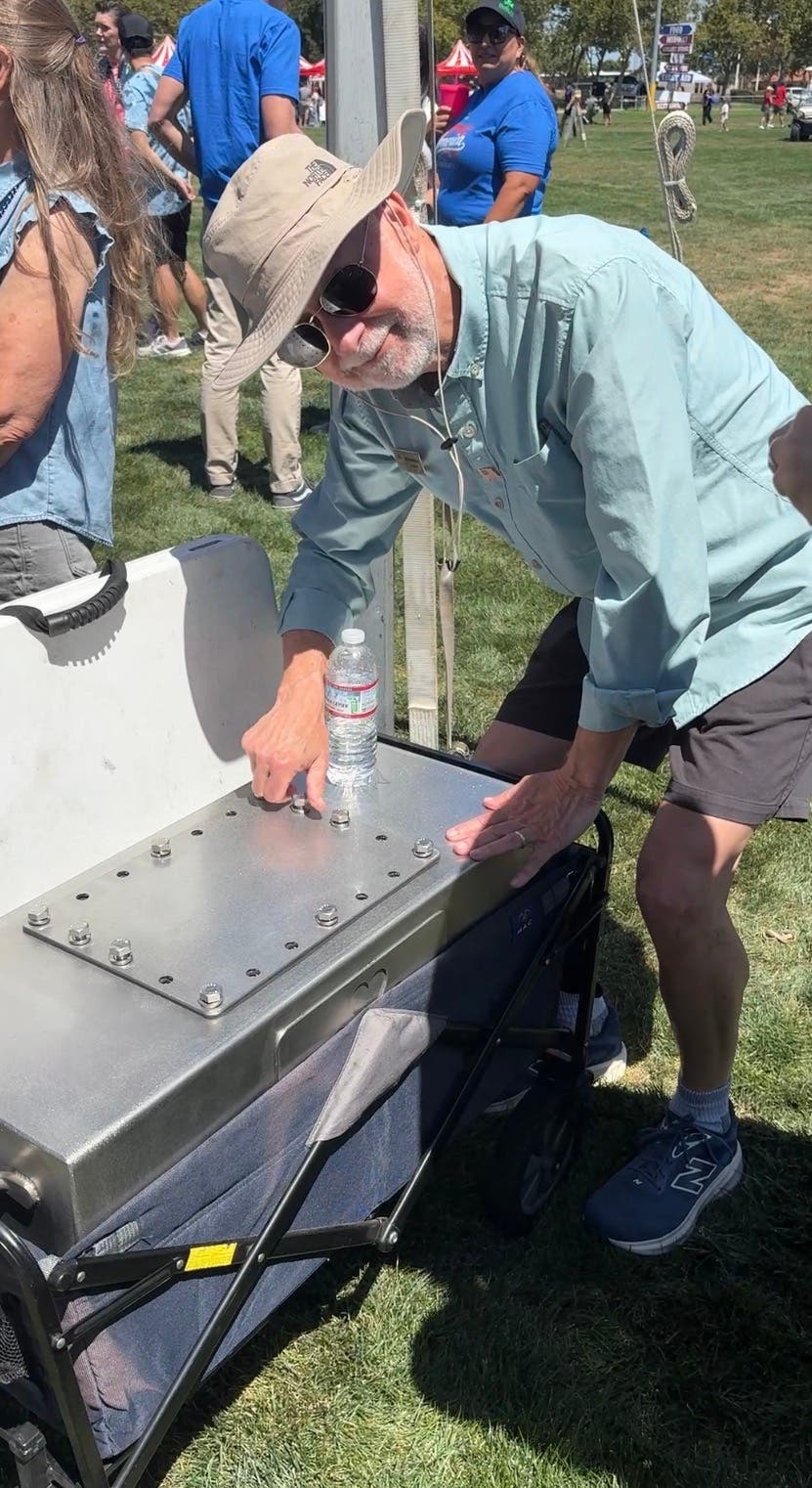 Man and metal box