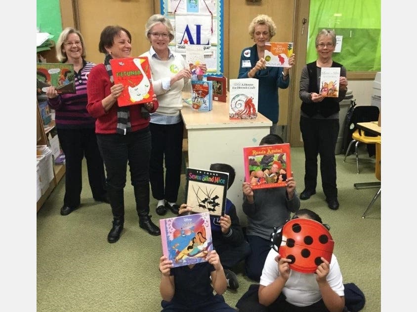 Member volunteers and students alike, “…Love to R.E.A.D!”