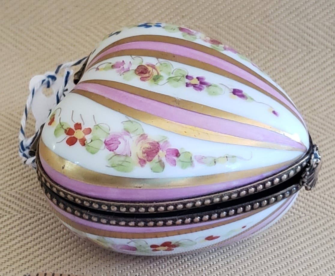 This hand-painted French Limoges Trinket Box could be gracing your living space.