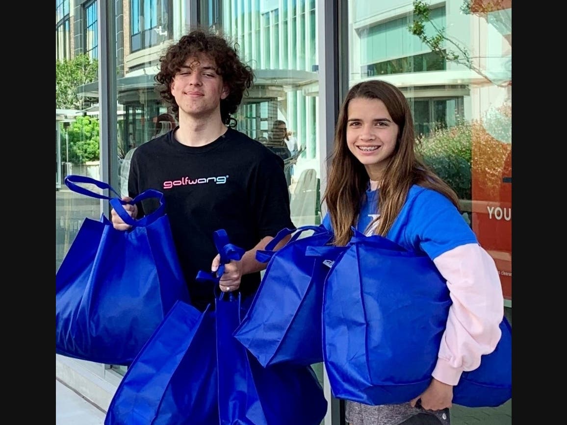 Assisteens shop for clothes for homeless youth at local Old Navy Stores.