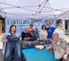 Broadway Plaza, W C Senior Marketing Manager Tracy Dietlein (l) and Greg Aguirre help Assistance League of Diablo Valley members Betty Miller, Linda Mercer, Lyn Smith and Suzi Geldin collect/transport donated denim clothing for a future thrift shop event.
