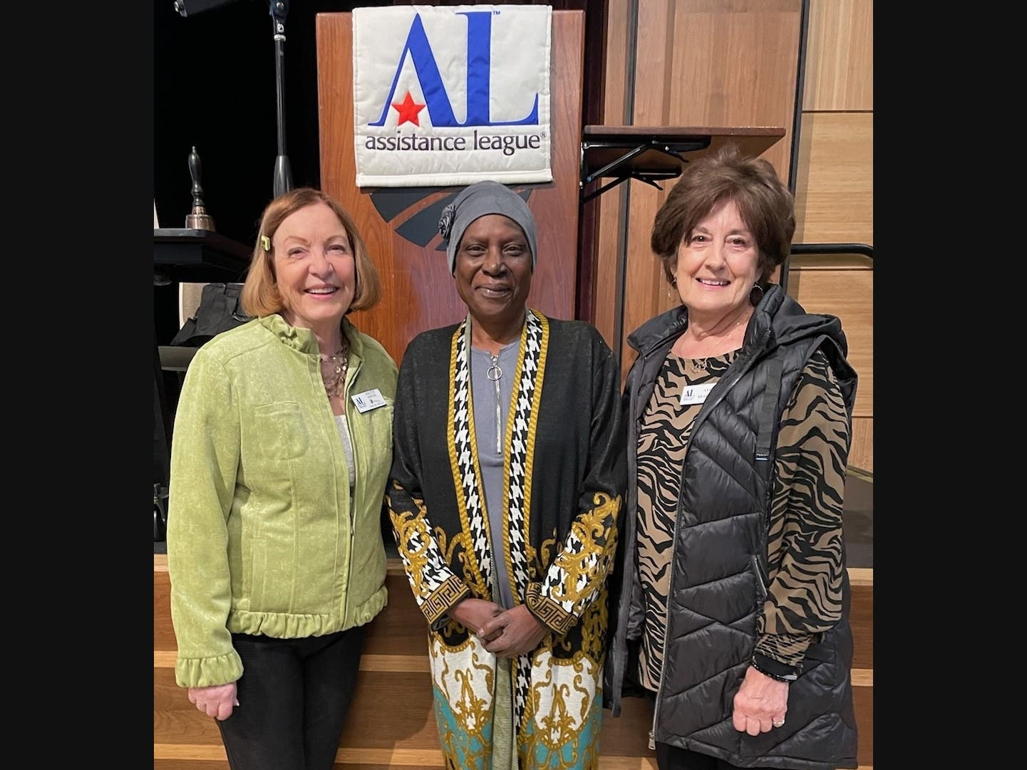 Assistance League Diablo Valley President Arlita Smith (l), and Assault Survivor Kits Co-Chair Vera Braswell (r), receive thanks from Cynthia Peterson (c), Executive Director of Community Violence Solutions, Contra Costa County.