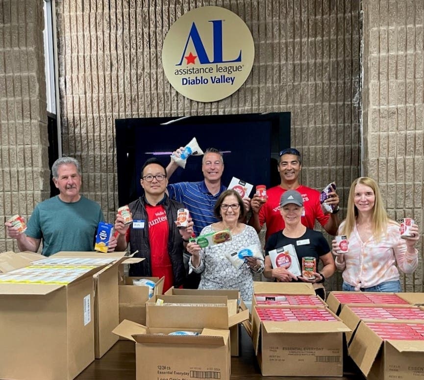 Food Boxes Chair Janet Venturino (row 1, 4r), and committee members Gerry Merola and Eileen Short, thank Community Partners from Wells Fargo Bank Martin Jaspovice, Andy Tew, (row 2) Brad Hershey and Logan Taylor for preparing 60 food boxes.