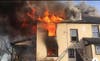 The blaze at a home in Delaware, pictured above, left one firefighter with ties to Chester Co. severely injured.